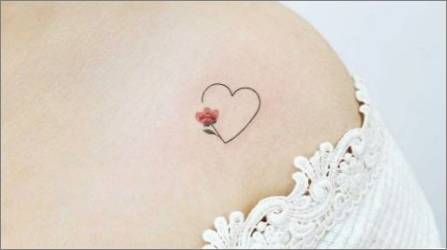 Tetovējums ar mīlestības simboliem